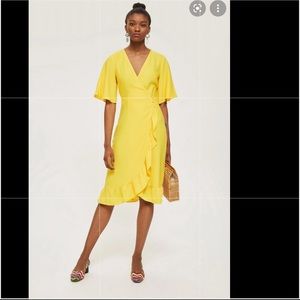 BNWT Beautiful yellow wrap dress.